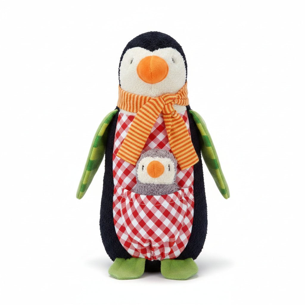 Plush toy penquin with striped scarf and gingham front, with baby penguin in pouch on a white background
