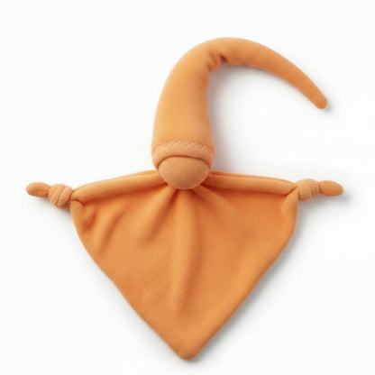 Orange Keptin Jr. doll on a white background