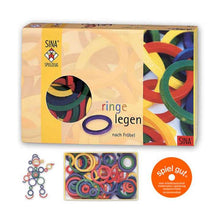 Colorful wooden ring and half ring set with packaging and additional rings displayed on a white background