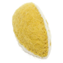 Underside of felt lemon wedge on a white background