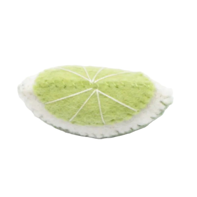 Felted lime wedge on a white background
