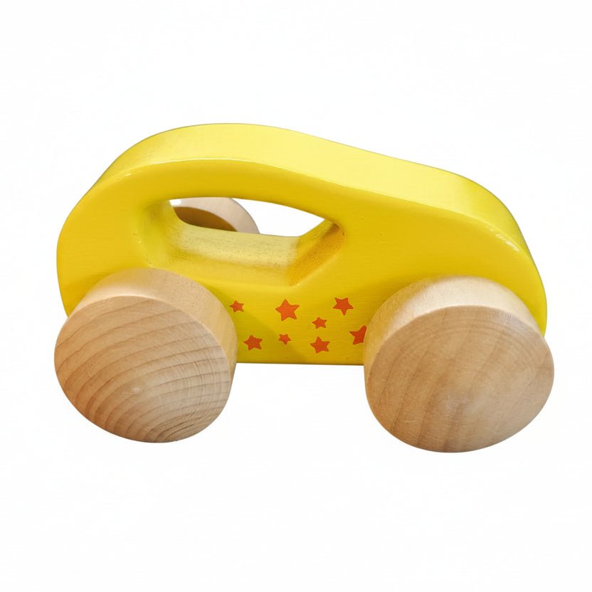 A yellow wooden toy car with natural wood wheels and small red star details, on a white background
