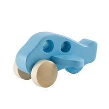 Blue wooden toy car with beige wheels on a white background