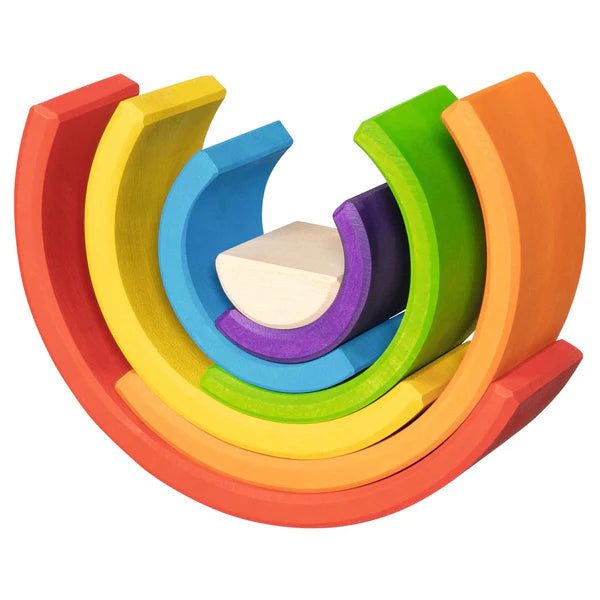 Colorful wooden toy with stacked rings on a white background