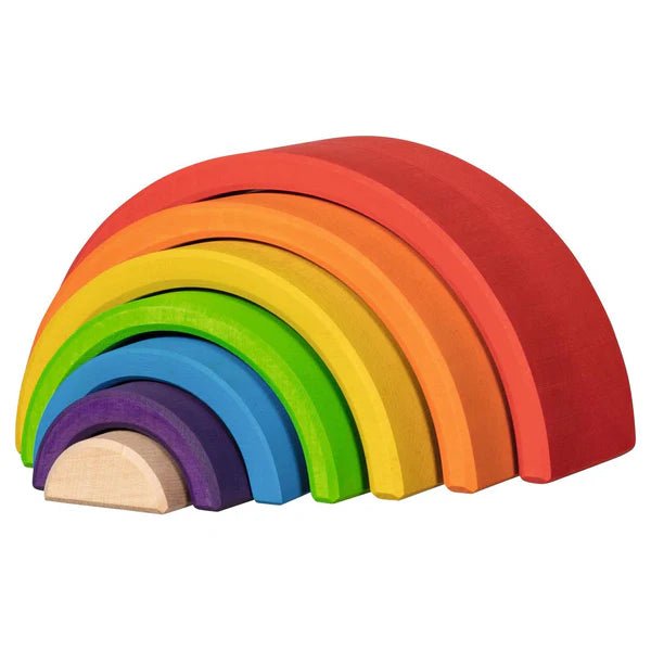 Set of colorful wooden rainbow blocks on a white background