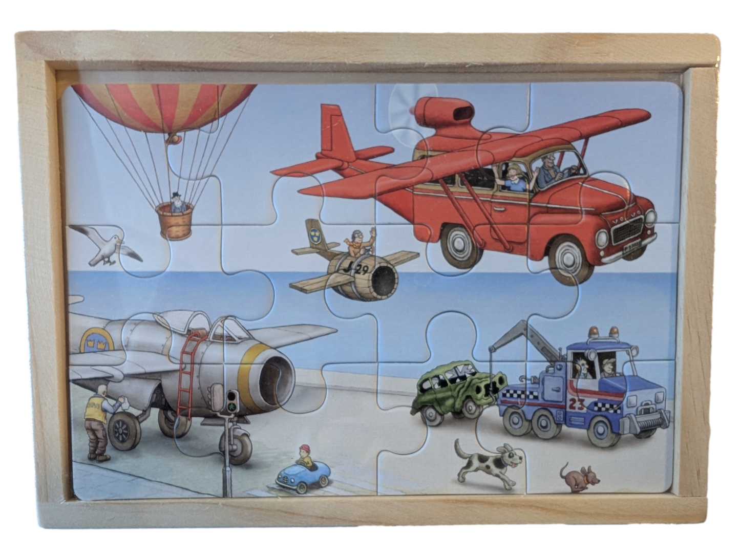 Children's puzzle illustrated by jan loof, with vehicles and a wooden frame