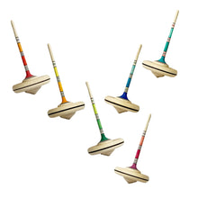 Six spinning tops with long handles on a white background