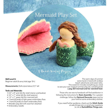 Mermaid play set with a mermaid doll and pink clam shell on a blue background with materials included in kit