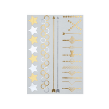 Sheet of temporary tattoos with stars, circles, and arrows on a white background