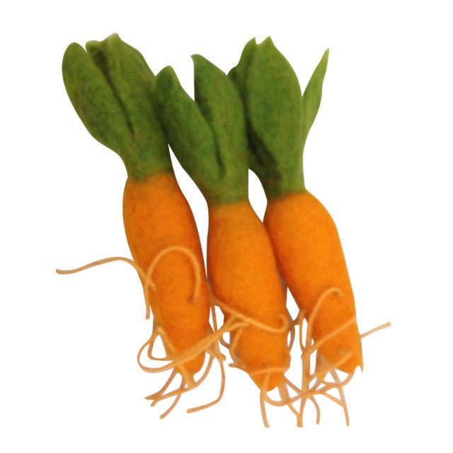 3 felted carrots on a white background