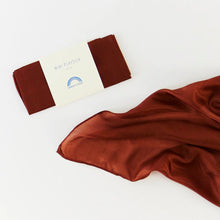 Brown playsilk on a white background