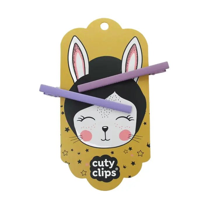 Plum & Orchid hair clips on Cuty Clips branded packaging with white background
