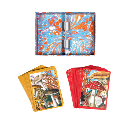 Card decks with mushroom illustrations on a white background