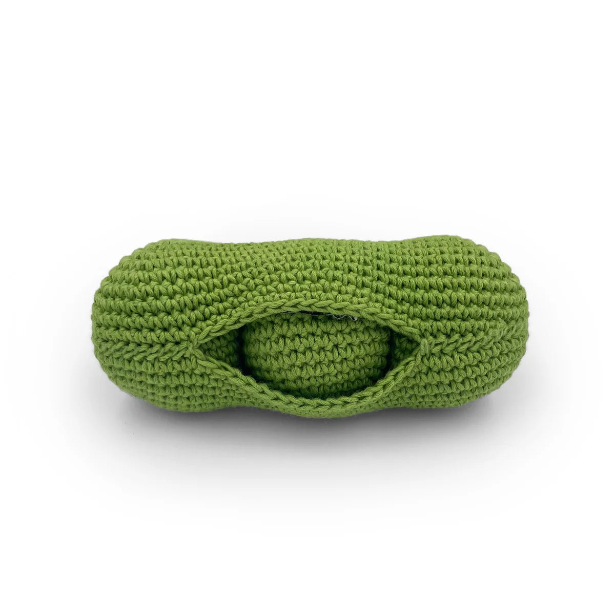 Green crocheted green pea toy on a white background
