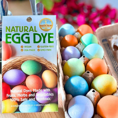Earth Paint Natural Egg Dye packaging with colorful dyed eggs in a carton.