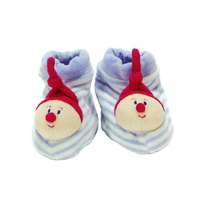 Pair of baby booties with cartoon face design on a white background