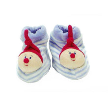 Pair of baby booties with cartoon face design on a white background