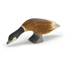 Canada Goose wooden figure with its neck outstretched on a white background