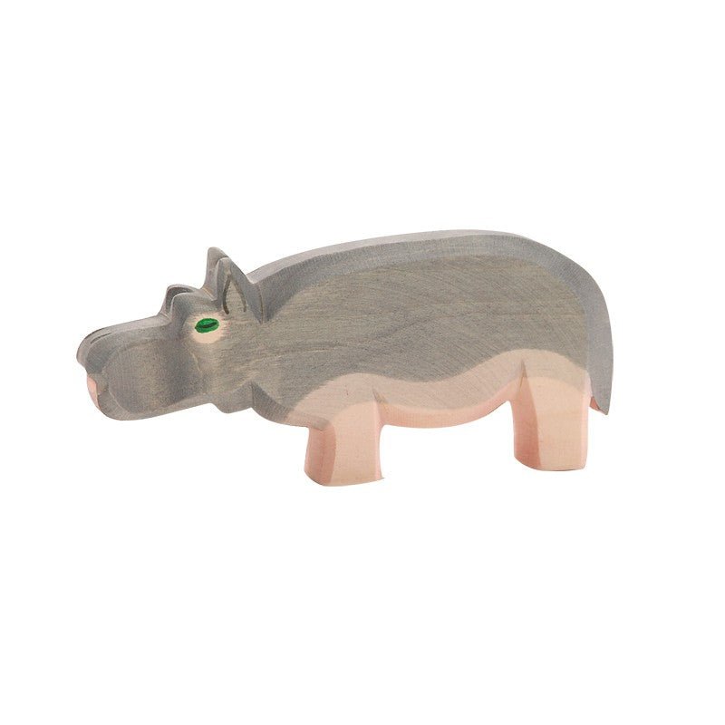Wooden hippo toy on a white background