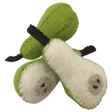 Felted whole pear and two halves on a white background