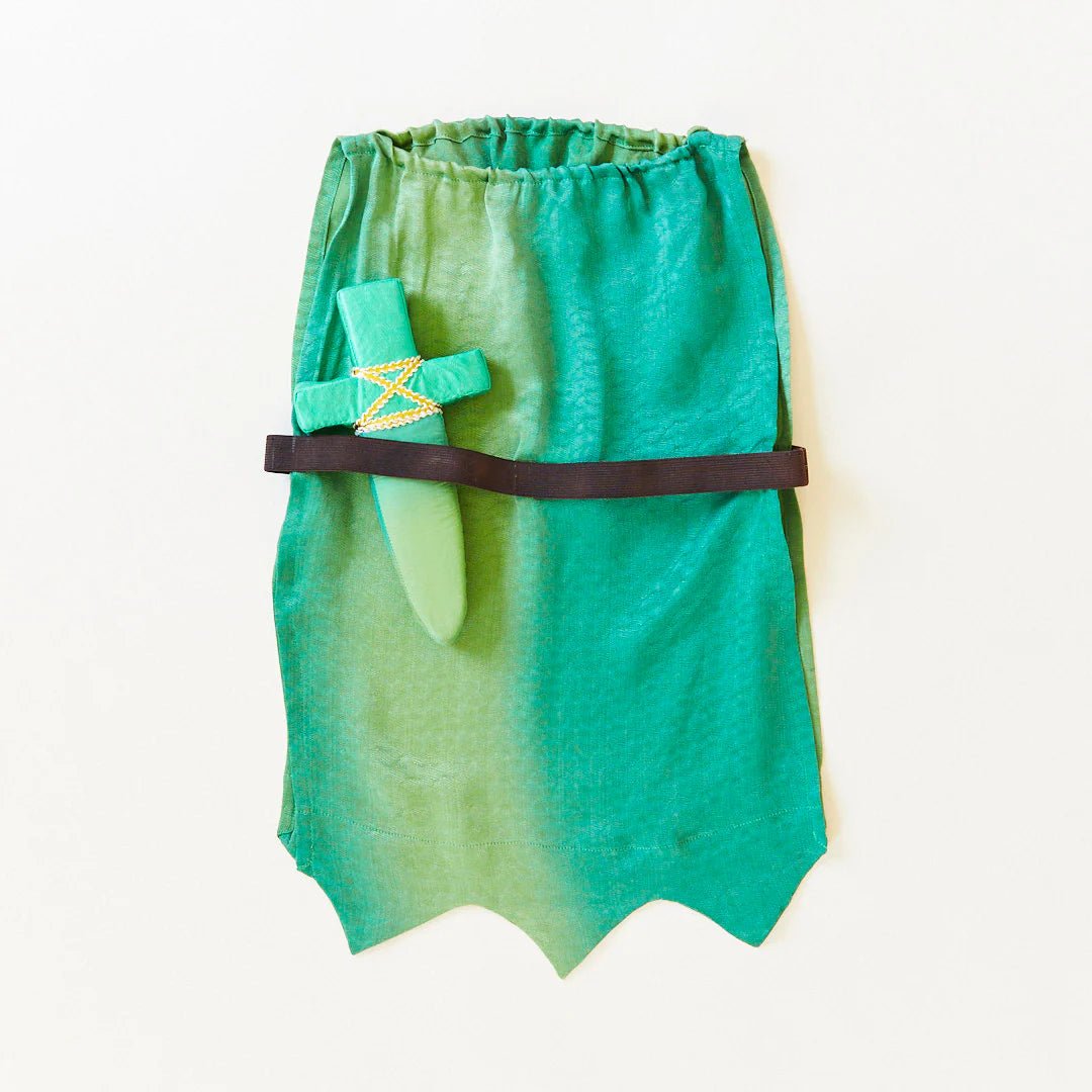 Green silk costume with a green silk dagger in the waistband on a white background