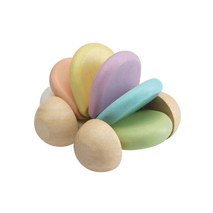 90 degree view of Plan Toys pastel baby car on a white background