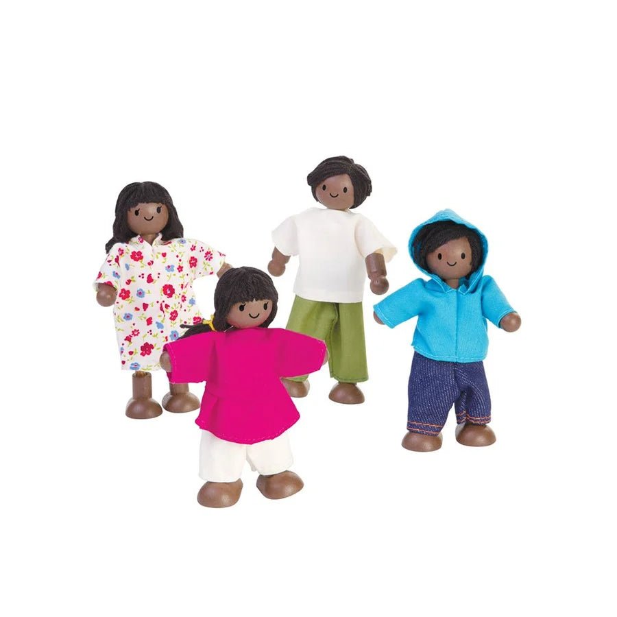 4 wooden dolls with dark skin on a white background
