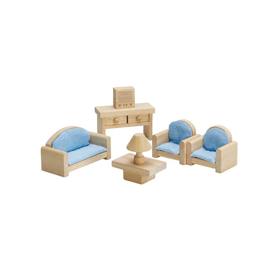 Wooden doll living room furniture arranged in a half circle on a whitebackground