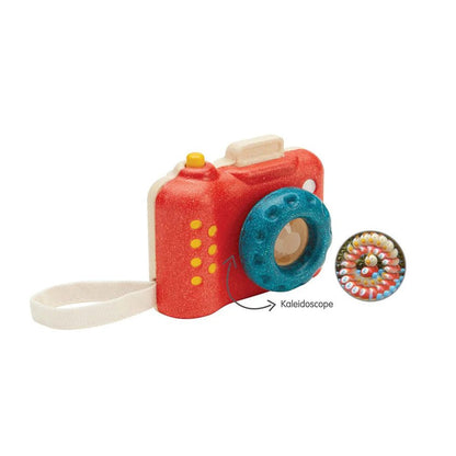 Toy camera with a kaleidoscope attachment on a white background