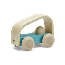 Blue wooden car at an angle on a white background