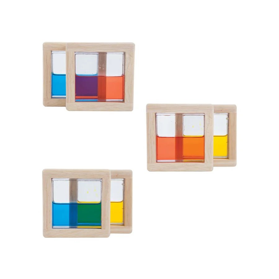 Colorful square blocks filled with colored water on a white background