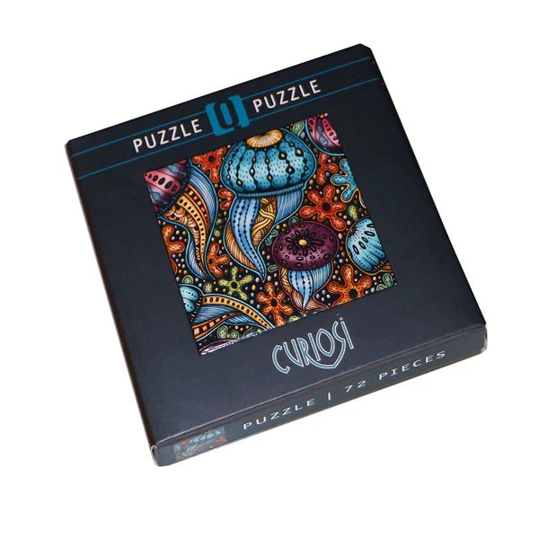 Curiosi puzzle box with colorful jellyfish design on a white background