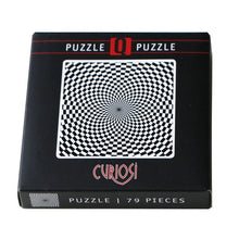 Black puzzle box with a checkered design and 'Curiosi' branding on a white background