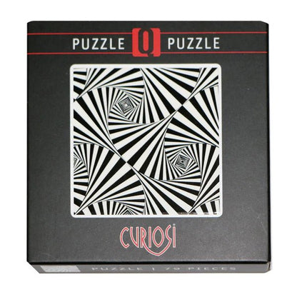 Puzzle box with black and white geometric design and 'Curiosi' branding.