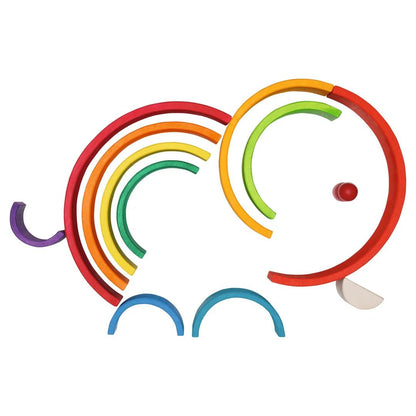 Colorful woode half circle blocks in the shape of an elephant on a white background