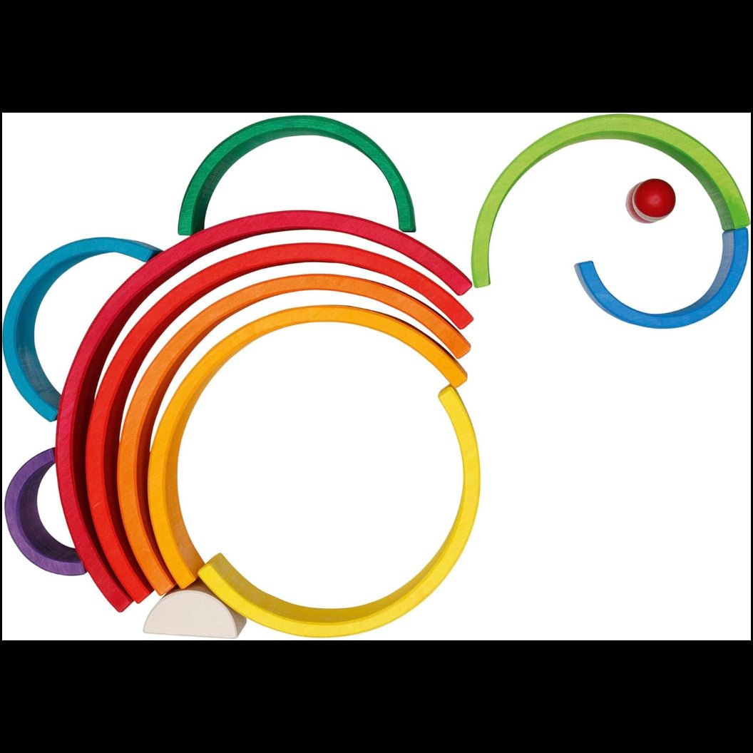 Set of colorful wooden half circle shapes on a white background