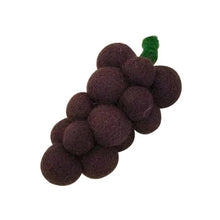 Bunch of felted red grapes on a white background