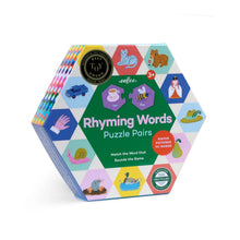 Hexagonal box of 'Rhyming Words Puzzle Pairs' educational toy with colorful illustrations on a white background.