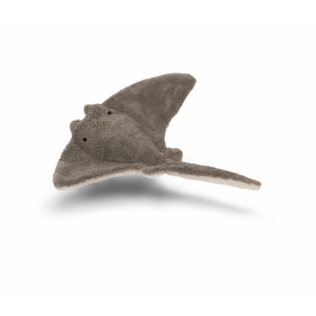 Plush toy manta ray on a white background