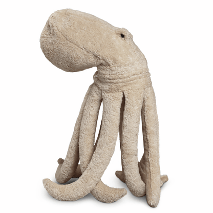 Beige plush octopus toy on a white background