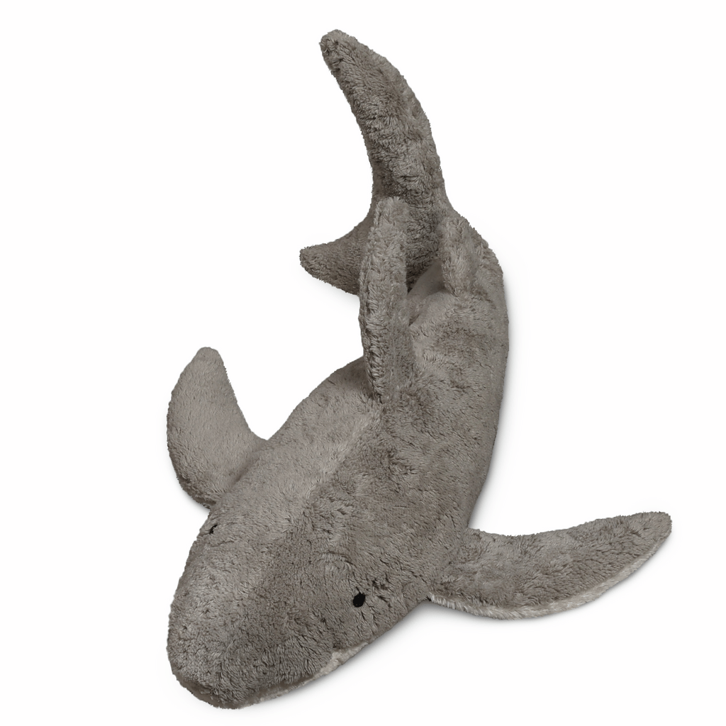 Stuffed shark toy on a white background
