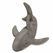 Stuffed shark toy on a white background
