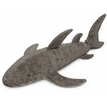 Plush shark toy on a white background