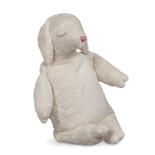 White sheep stuffed animal on a white background