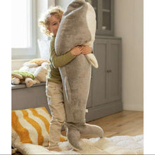 Child holding XXL Giant Whale