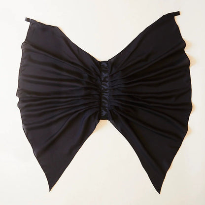 Black silk wings on a white background
