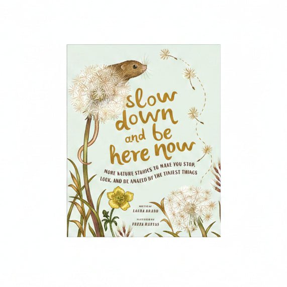 Book cover with a mouse and dandelions, featuring the text 'slow down and be here now'.
