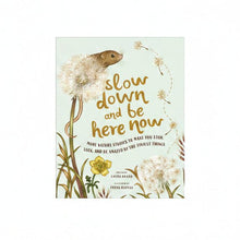 Book cover with a mouse and dandelions, featuring the text 'slow down and be here now'.