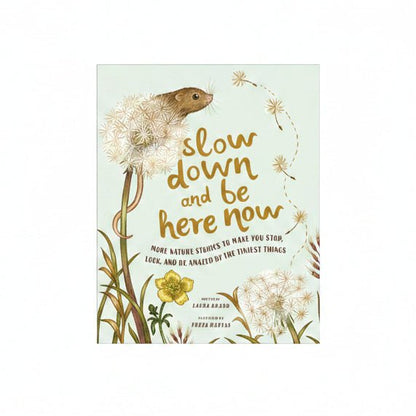 Book cover with a mouse and dandelions, featuring the text 'slow down and be here now'.