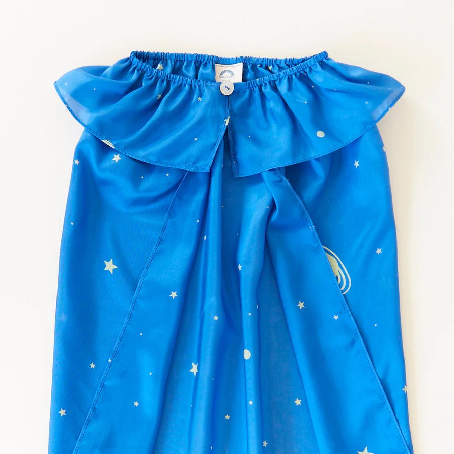 Blue silk cape with star pattern and button closure at neck